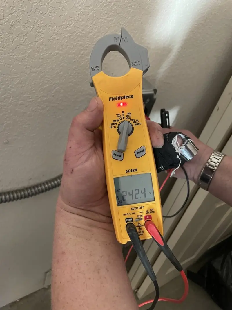 Voltage testing with clamp meter during Electrical Installation Services in University Place
